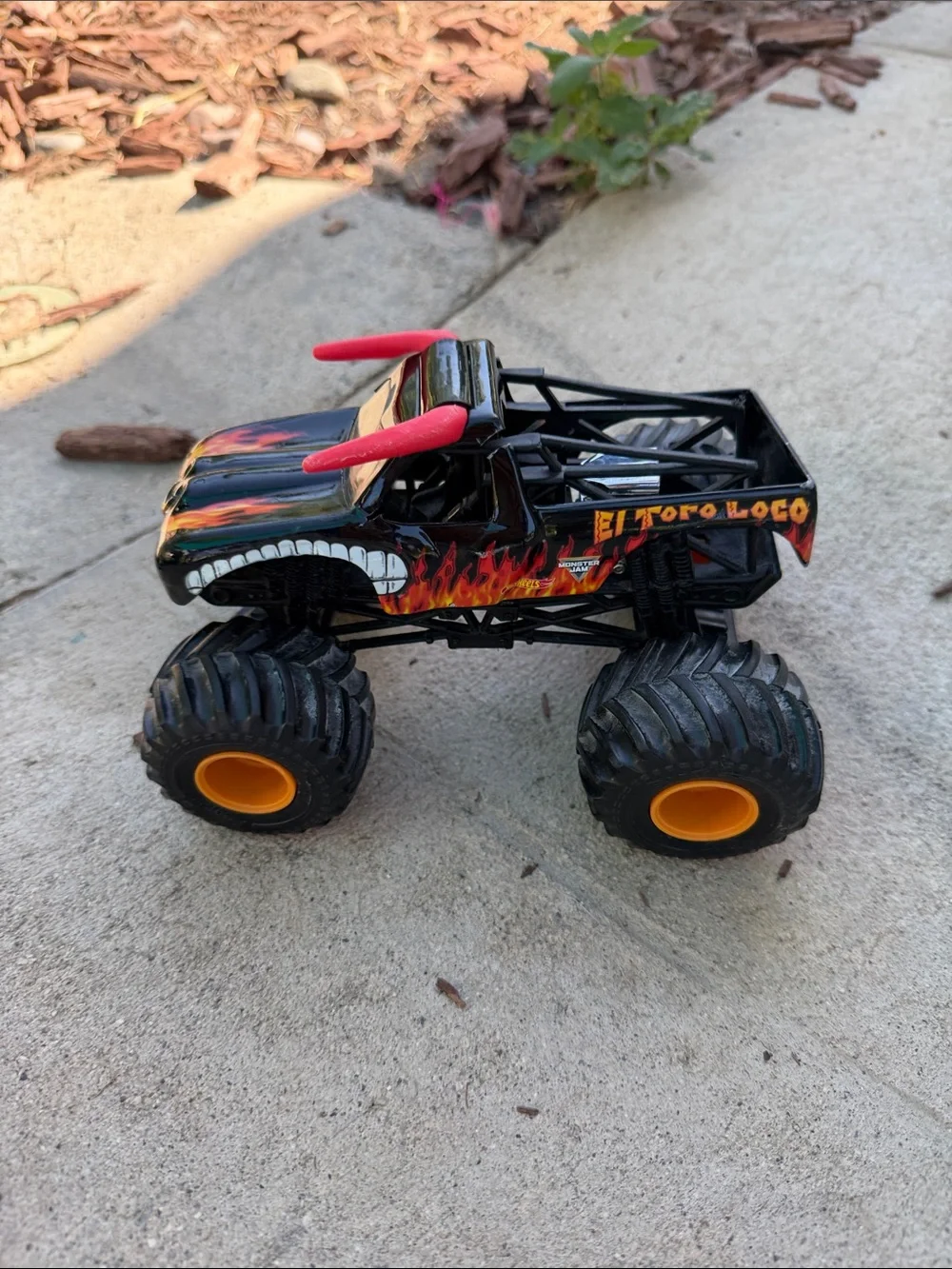 El Toro Loco Monster Truck Toy - Black with Red and Orange Accents